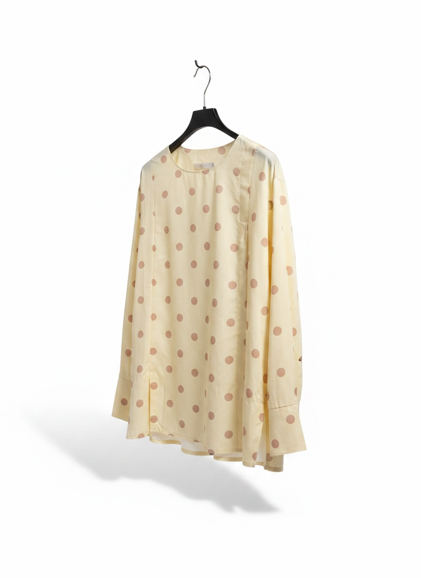 La blouse à pois jaune