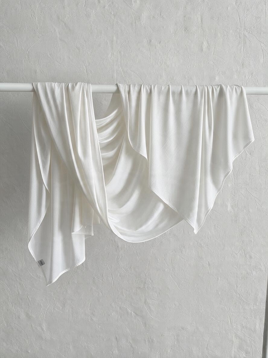 Le jersey liquide blanc