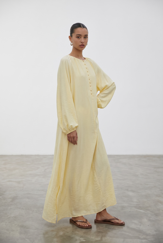 La robe bouton jaune