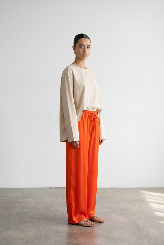 Le pantalon satinée orange