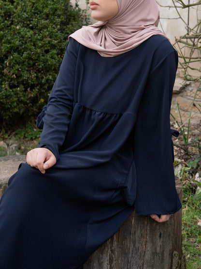 La robe fluide bleu nuit
