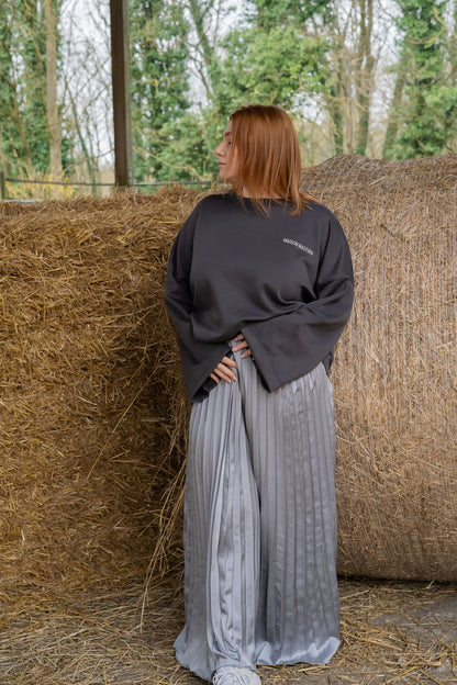 La jupe plissée grise