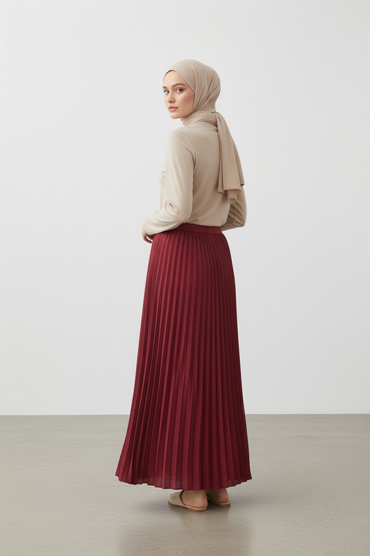 La jupe plissée rouge