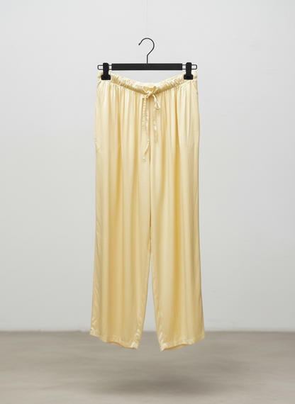 La pantalon satinée jaune