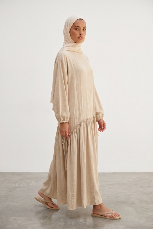 La robe fluide beige