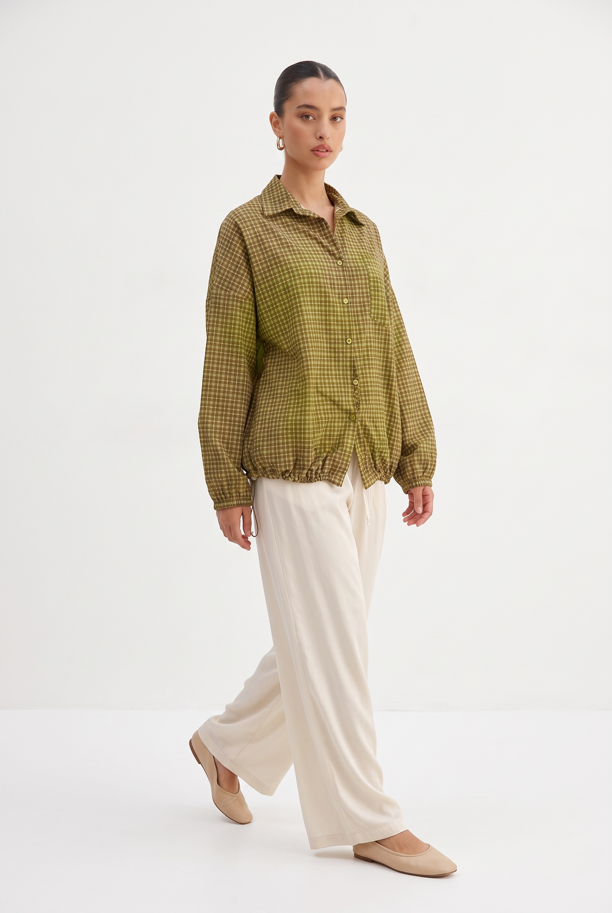 La veste à carreaux verte