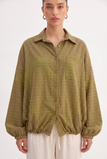 La veste à carreaux verte