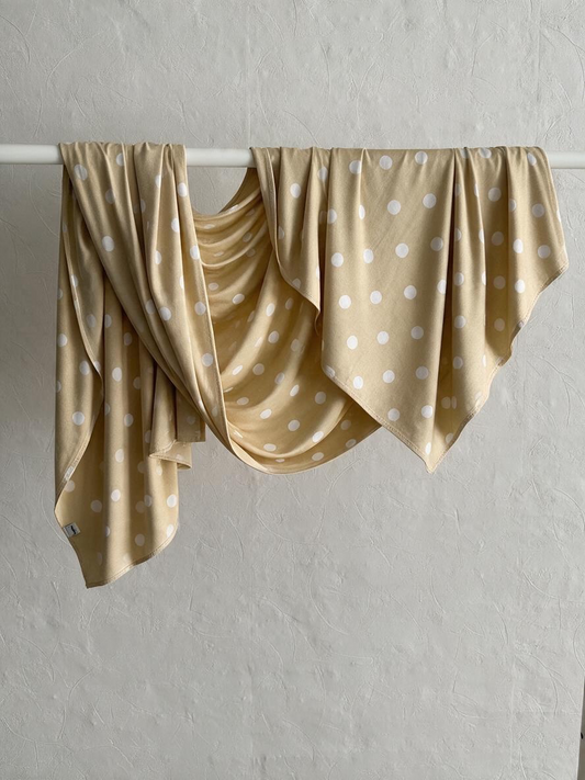 Le jersey liquide à pois beige